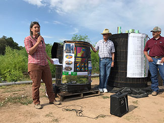 Amy Larsen, Dr. Johnson, and Tom Dominguez Beside Johnson-Su Bioreactor Compost Bin