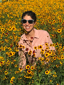 Adrienne Rosenberg in Wildflower Plot with Yellow Coreopsis